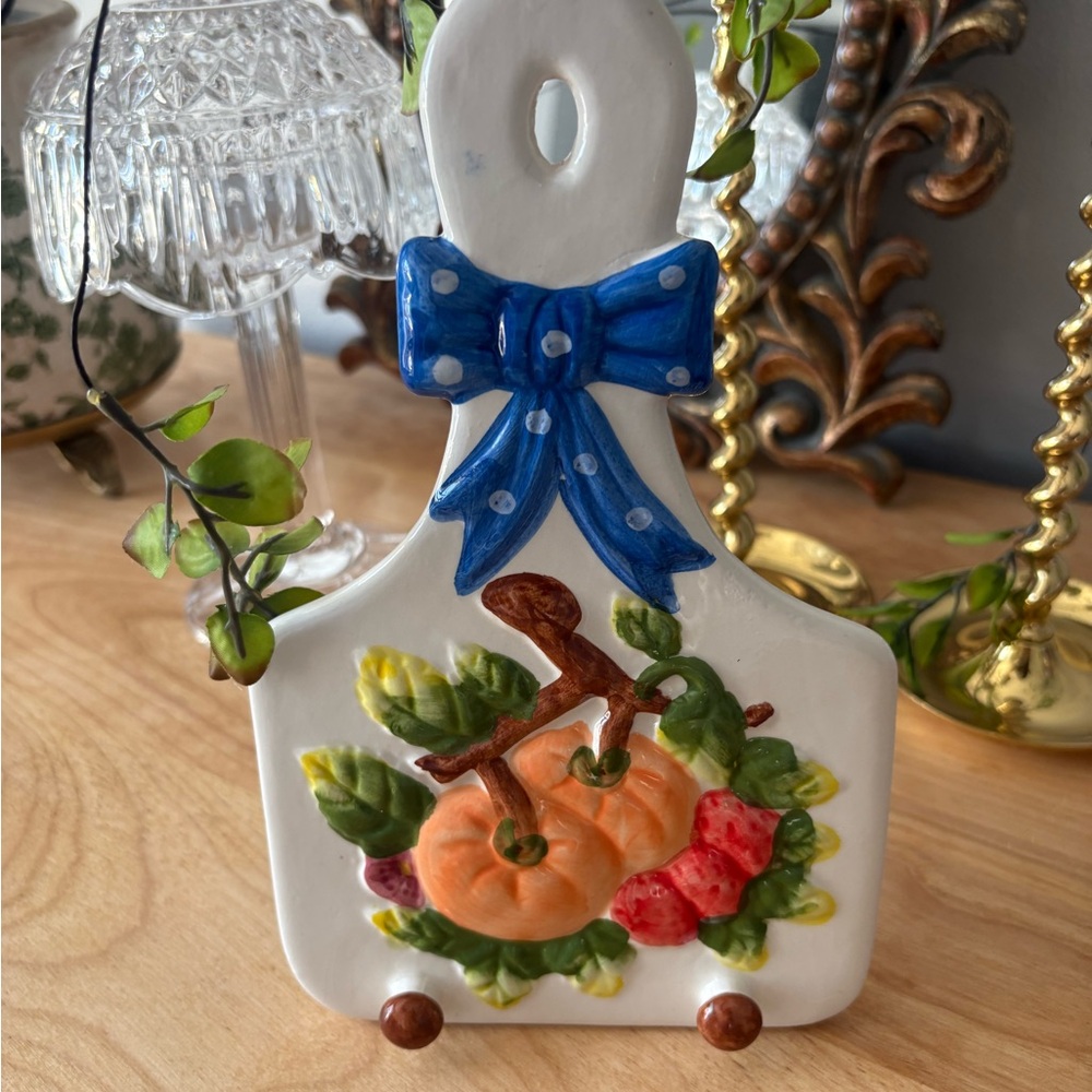 Vintage decorative ceramic wall plaque, likely vintage